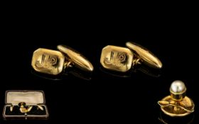A Pair Of Gents 18ct Gold Cufflinks marked 18ct. Weight 7.1 grams.