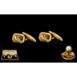 A Pair Of Gents 18ct Gold Cufflinks marked 18ct. Weight 7.1 grams.