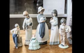 Collection of Six Porcelain Figures, comprising a Nao figure of a girl with a puppy, 9.5'' tall, a