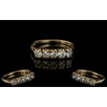 A 9ct Gold Dress Ring Set With 5 CZ's.