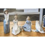 Four Nao Figurines, comprising a girl in hat, a goose,