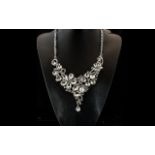 White Crystal Asymmetric V Shape Floral Necklace, a luxurious bib necklace,