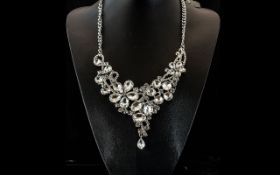White Crystal Asymmetric V Shape Floral Necklace, a luxurious bib necklace,