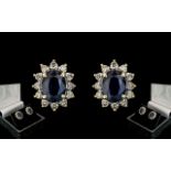 A Fine Pair of 18ct Gold Diamond and Sapphire Set Earrings. Marked 18ct to Post.