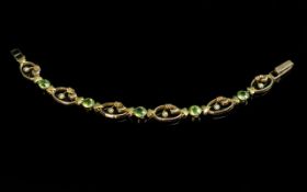 Edwardian Period 1902 - 1910 Attractive Well Designed 15ct Gold Peridot and Seed Pearl Set Bracelet.