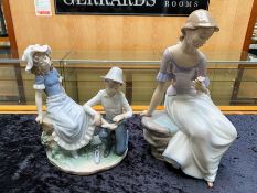 Two Nao Figural Groups, comprising a young girl having her foot bandaged by a young man, 10''