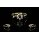 Ladies 18ct Gold Attractive / Exquisite Rubies and Diamond Cluster Ring. Flower head Design. Full