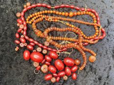 Amber Style Beads, some loose, Baltic colour and barrel shaped amber style beads.