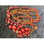 Amber Style Beads, some loose, Baltic colour and barrel shaped amber style beads.