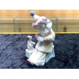 Lladro Pierrot Clown with Puppy & Concertina. No. 5279. Dated 1984, measures 6'' tall.