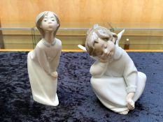 Collection of Lladro Angels, comprising No. 5728 'Angel Dreaming', No. 4340 'Angel with Flute', '