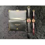 Two Raymond Weil Watches, his and hers gold plated wrist watches, Model 9136 and 9936. Burgundy