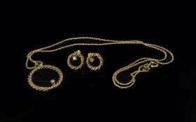 9ct Gold Necklace and Earring Set, contemporary twist style with circular pendant with diamond and