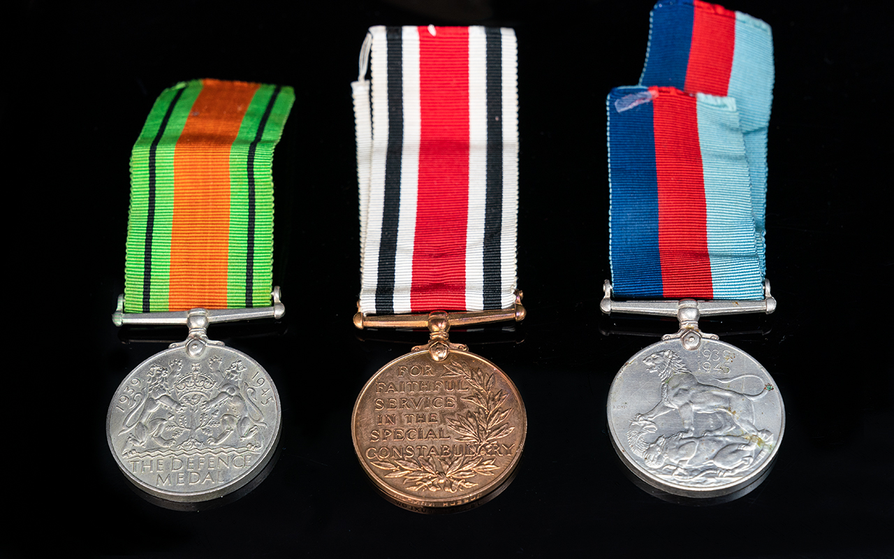 World War II Medals with Ribbons, awarded to Joseph Huxlow. 1. 1939 - 1945 Defence Medal with - Image 2 of 3
