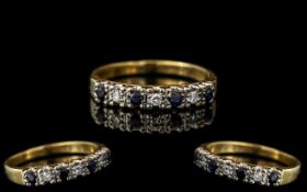 Ladies 18ct Gold Attractive Diamond and Sapphire Set Ring. Marked 18ct to Interior of Shank.