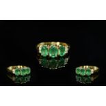 14ct Gold - Attractive Emerald and Diamond Set Ring. Marked 14ct to Interior of Shank. The Oval