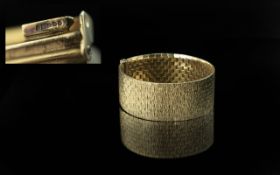 Mid 1970s Superb 9ct Gold Wide Band Fashion Bracelet with full hallmark for 9.375; 1 inch (2.5cms)