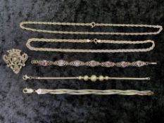 Small Collection of Silver Jewellery, comprising a three strand twist bracelet, a silver brooch in a