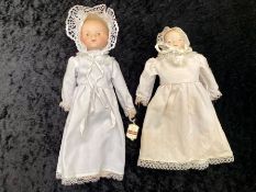 Two Vintage Porcelain Headed Dolls, both with porcelain hands and arms to elbow, hand painted faces.