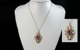 A Fine Quality 9ct Gold Openworked Amethyst and Pearl Set Pendant, of elaborate form, with