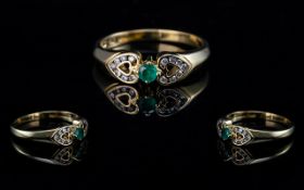 18ct Gold Emerald and Diamond Ring, lovely design with the diamonds set in a heart shape; fully