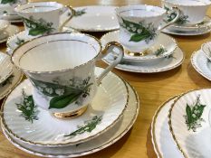 Lubern bone china 28 piece tea set with a Lily of the Valley design. Pieces included in this