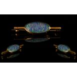 Antique Period Superb 9ct Gold Brooch, set with an oval shaped black opal, est.weight 3.5cts, marked