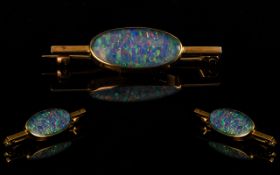 Antique Period Superb 9ct Gold Brooch, set with an oval shaped black opal, est.weight 3.5cts, marked