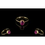 Ruby Solitaire Ring, an oval cut solitaire ruby, of excellent colour and of just under 2cts, claw