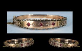 Edwardian Period - Attractive 9ct Gold Hinged Bangle Set with Rubies and Diamond Set with Safety