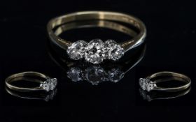 18ct Gold and Platinum Three Stone Diamond Set Ring, marked 18ct and platinum, the three round