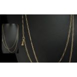 Antique Period Pleasing 9ct Gold Guard Chain of excellent design and long length, marked 9ct, with