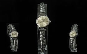 Omega Ladies Steel Cased Mechanical Wristwatch with Excalibur steel expanding watch bracelet; in