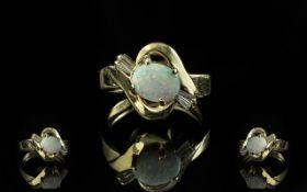 Ladies 14ct Gold - Stylish Opal and Diamond Set Dress Ring. The Oval Shaped Opal Flanked by Two