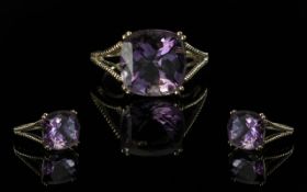 Ladies 9ct Gold Attractive Single Stone Amethyst Set Ring. Marked 9ct to Shank. The Square Shaped