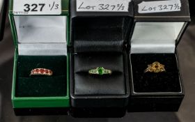 Three 9ct Gold Dress Rings, set with Citrine, Garnet and green Tourmaline coloured stones. Green