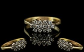 18ct Gold Diamond Cluster Ring, set with round modern brilliant cut diamonds, stamped 750. Ring size