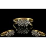 18ct Gold Diamond Cluster Ring, set with round modern brilliant cut diamonds, stamped 750. Ring size