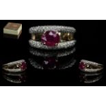 Ladies 9ct Gold Contemporary Ruby & Diamond Set Fashion Ring. Two bands of diamonds with Ruby set