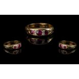Antique Period Attractive Ladies Three Stone Ruby and Diamond Set Ring, marked 18ct to interior of