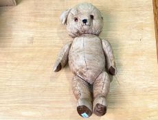 Large Early 20th Century Growler Teddy Bear, a straw filled teddy with bells in his ears, early
