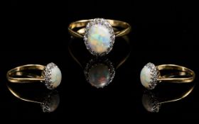 Antique Period 18ct Gold Attractive Opal and Diamond Set Ring, the central opal, of excellent