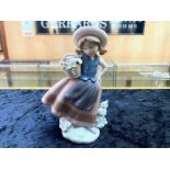 Lladro Figure No. 5221 ''Sweet Scent'', Girl with Basket of Flowers, 7'' tall.