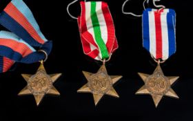 World War II Trio of Military Medals, unnamed. 1. 1939-1945 Star with ribbon. 2. Italy Star with