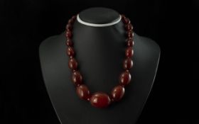 A Fine Quality Cherry Amber Graduated Beaded Necklace. Each Bead Knotted, Wonderful Colour. Length
