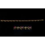 18ct Gold - Good Quality Ladies Ruby and Diamond Set Bracelet. Marked 18ct. Rubies and Diamonds of