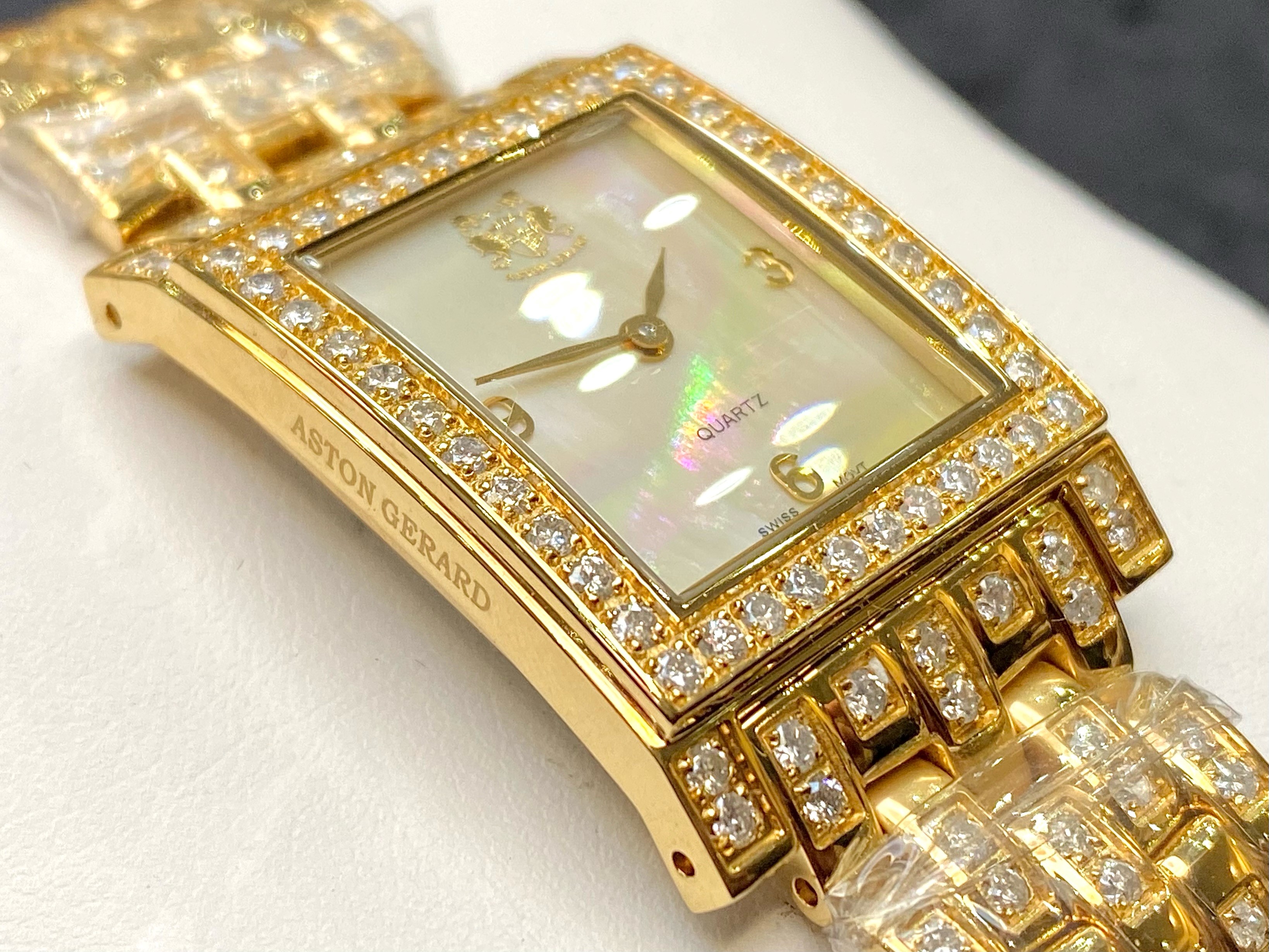 Aston Gerard Diamond Set Gold Plated Watch, set with 99 diamonds approx weight 2.12 cts. Brand new