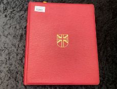 Stamp interest: Red Stanley Gibbons loose leaf illustrated GB stamp album - Partially filled with