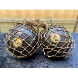 Pair of Vintage Heavy Wooden Crown Green Bowling Balls, in a string carrier.