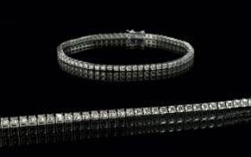 18ct White Gold Diamond Tennis Bracelet, set with 70 round modern brilliant cut diamonds, est. total
